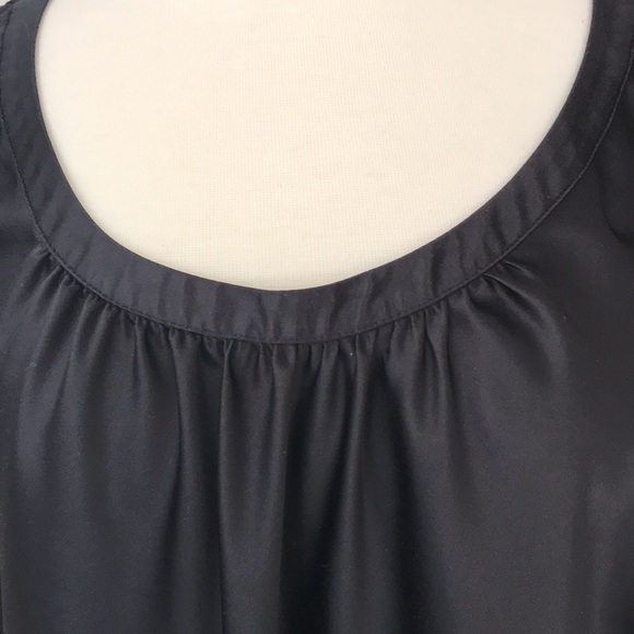Satiny black top with a bit of stretchy. - Picture 2 of 4